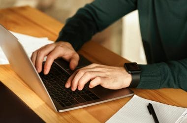 man using laptop to work