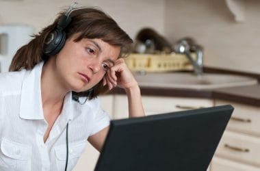 woman working from home looking tired
