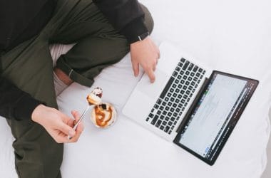 Person working from home eating while on the computer